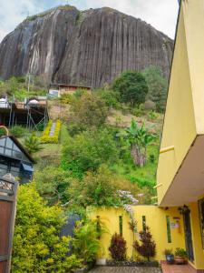 a view of a mountain from a building at Hermosa casa de campo en GUATAPÉ in Guatapé