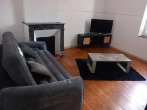 TV a/nebo společenská místnost v ubytování appartement grand T2