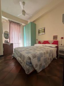 Postel nebo postele na pokoji v ubytování Casa alla Spiaggia - Taormina