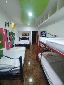 Postel nebo postele na pokoji v ubytování CASA ZOE