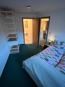 Postel nebo postele na pokoji v ubytování Ferienwohnung an der Kirchruine