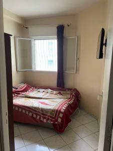 Ένα ή περισσότερα κρεβάτια σε δωμάτιο στο Appart Zen Kenitra