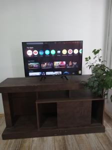 TV a/nebo společenská místnost v ubytování Temporary accommodation in Mercedes Soriano