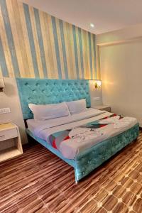 Una cama o camas en una habitación de Jacks Calangute Place