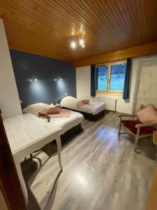 Postel nebo postele na pokoji v ubytování Hôtel la Kinkerne