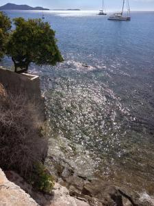 a large body of water with a boat in the distance at Le Côte d'Azur in Toulon