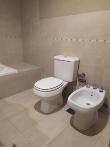 Ένα μπάνιο στο NORDELTA BAHIA GRANDE Monoambiente con cochera