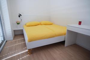 Postel nebo postele na pokoji v ubytování Apartma Eva