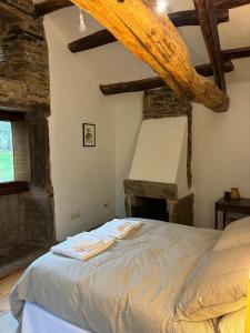 Postel nebo postele na pokoji v ubytování Casas do Campo