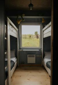 Postel nebo postele na pokoji v ubytování Strefa Warmia