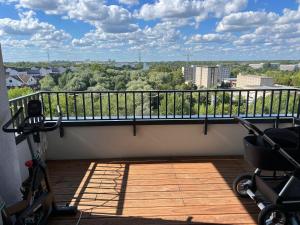 a balcony with a view of a city at Premium Room near S-Bahn Station in Berlin