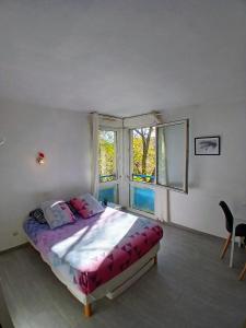 Postel nebo postele na pokoji v ubytování Apartment Near Center