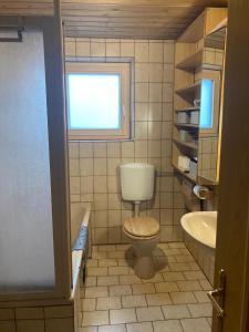 Ένα μπάνιο στο Ferienwohnung in Imst
