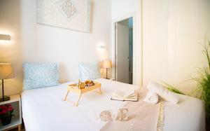 Ένα ή περισσότερα κρεβάτια σε δωμάτιο στο Luxury Premium Stay - Larios District Malaga Center