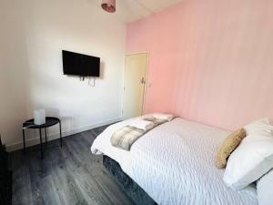 Ένα ή περισσότερα κρεβάτια σε δωμάτιο στο Pembroke Place Private Room 12B