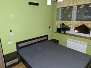 Postel nebo postele na pokoji v ubytování Lubań Center