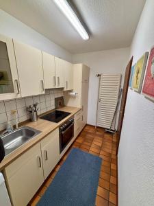 Η κουζίνα ή μικρή κουζίνα στο Charmantes Einzimmer Apartment in Kehl