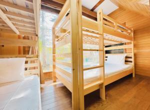 Postel nebo postele na pokoji v ubytování The Echoland