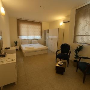 Ένα ή περισσότερα κρεβάτια σε δωμάτιο στο البيت الايطالي - Italiano House +10 φωτογραφίες