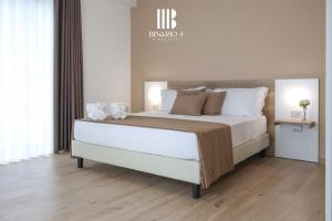 Ένα ή περισσότερα κρεβάτια σε δωμάτιο στο Binario 4 Rooms Suite +9 φωτογραφίες