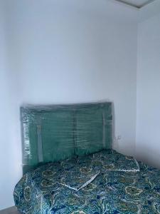 Ένα ή περισσότερα κρεβάτια σε δωμάτιο στο HALA Chaouni