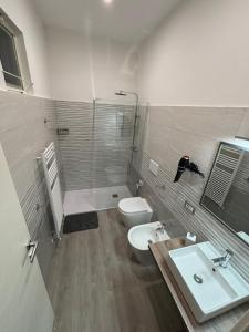 Koupelna v ubytování Traiano Rooms