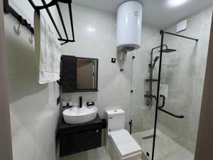 Koupelna v ubytování Comfort Residence + 24 fotografií