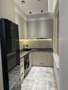 Kuchyň nebo kuchyňský kout v ubytování Comfort Residence