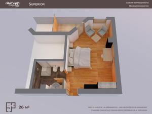 Postel nebo postele na pokoji v ubytování Chalet Laura Lodge Hotel