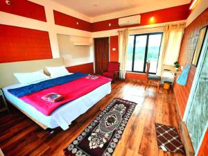 Postel nebo postele na pokoji v ubytování Srishti Home Stay + 7 fotografií