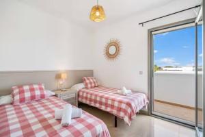 Ένα ή περισσότερα κρεβάτια σε δωμάτιο στο Villa Pina 20 +20 φωτογραφίες