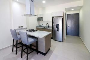 Kuchyň nebo kuchyňský kout v ubytování Nice apartment near the golden zone and the Marina + 17 fotografií