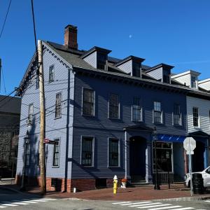 a blue and white building on a street corner at Townhouse in Portsmouth Downtown Historic District in Portsmouth