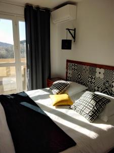 Postel nebo postele na pokoji v ubytování La Picholine en Provence + 14 fotografií