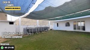 a view of a building with a large tent at Escápate con tu pareja sin salir de Lima in Cieneguilla