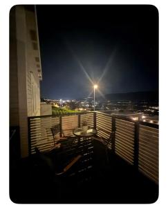 En balkon eller terrasse på Moderne familie hus + 6 billeder