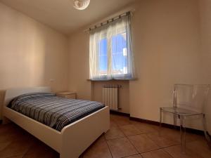 Postel nebo postele na pokoji v ubytování Casa Similli