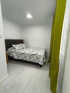 Ένα ή περισσότερα κρεβάτια σε δωμάτιο στο Cabañas Sol y Luna Lago Ranco +12 φωτογραφίες