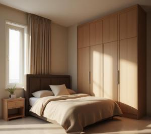 アダナにあるAdn Penta Apartのベッドルーム1室(ベッド1台付)、大きなキャビネットが備わります。