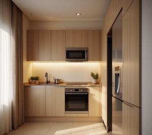 アダナにあるAdn Penta Apartのシンクと電子レンジ付きのキッチン