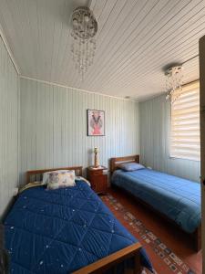 Postel nebo postele na pokoji v ubytování Puerto sureño