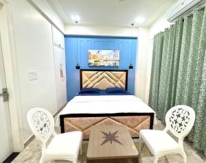 O zonă de relaxare la The Olivia Luxury - Stay step away from Laxman Jhula