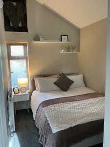 En eller flere senge i et værelse på Towneley Lodge, Burnley