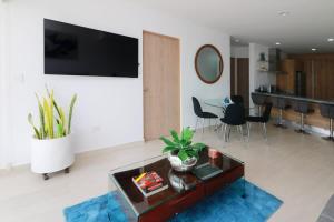 TV a/nebo společenská místnost v ubytování Hermoso departamento en cerritos