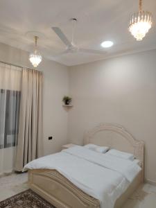 Postel nebo postele na pokoji v ubytování استراحة الساحل الشرقي صور