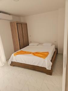 Ένα ή περισσότερα κρεβάτια σε δωμάτιο στο Apto N 302 vacacional