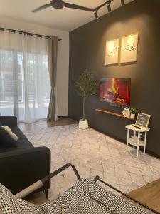 Posezení v ubytování Hafiyya Raintown Homestay, Taiping