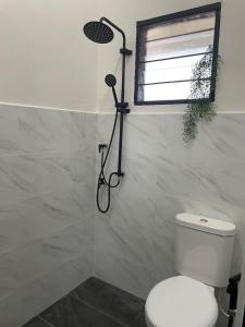 Koupelna v ubytování Hafiyya Raintown Homestay, Taiping + 23 fotografií