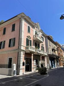 a large brick building on the side of a street at Casa Bent in Pescara