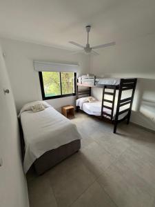 Postel nebo postele na pokoji v ubytování Altos de Las Sierras